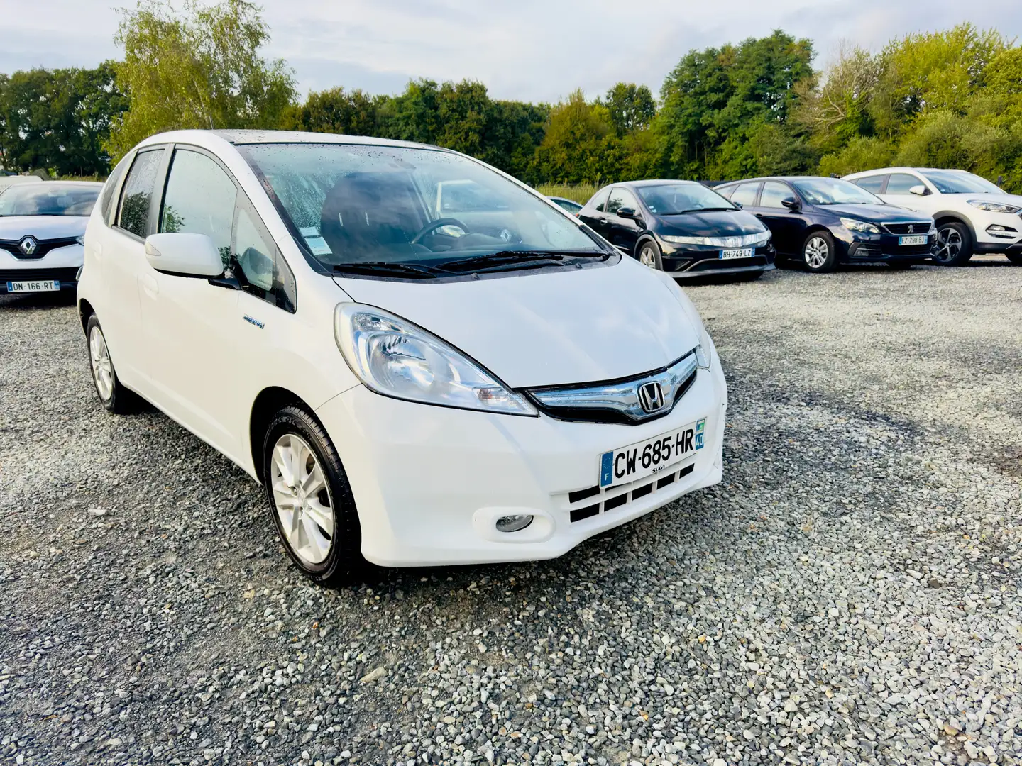 Honda Jazz Hybrid 1.3  i-VTEC + IMA Urban Luxury CVT Білий - 1