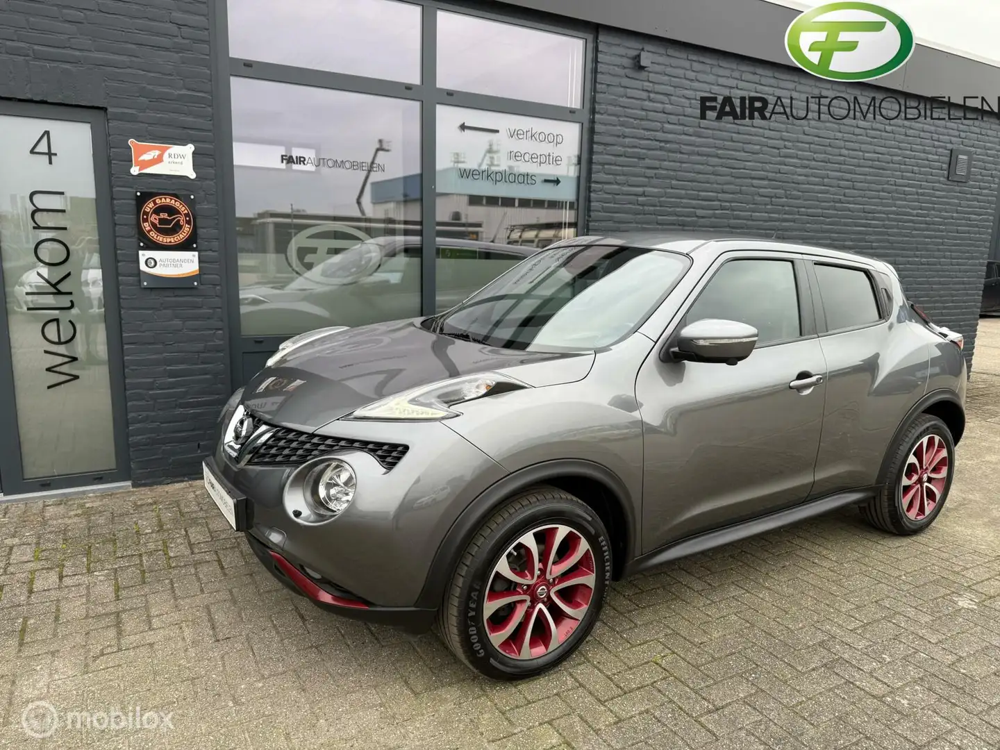 Nissan Juke 1.2 DIG-T TEKNA Grijs - 1