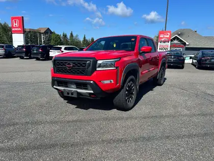 Red 2022 Nissan Frontier Pickup Truck Four-Wheel Drive Automatic