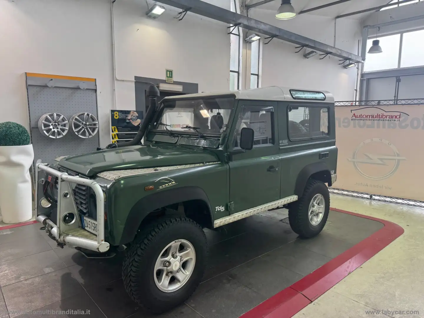 Land Rover Defender 90 2.5 Td5 Soft-Top+++GANCIO TRAINO Verde - 1