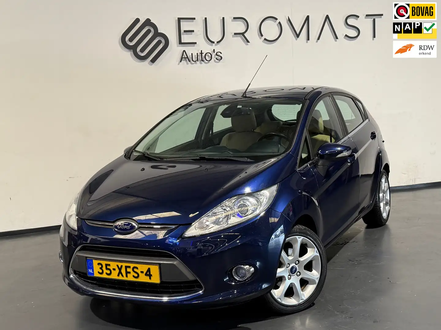 Ford Fiesta 1.25 Titanium Leder bekleding Airco Cruise Pdc Nie Blauw - 1