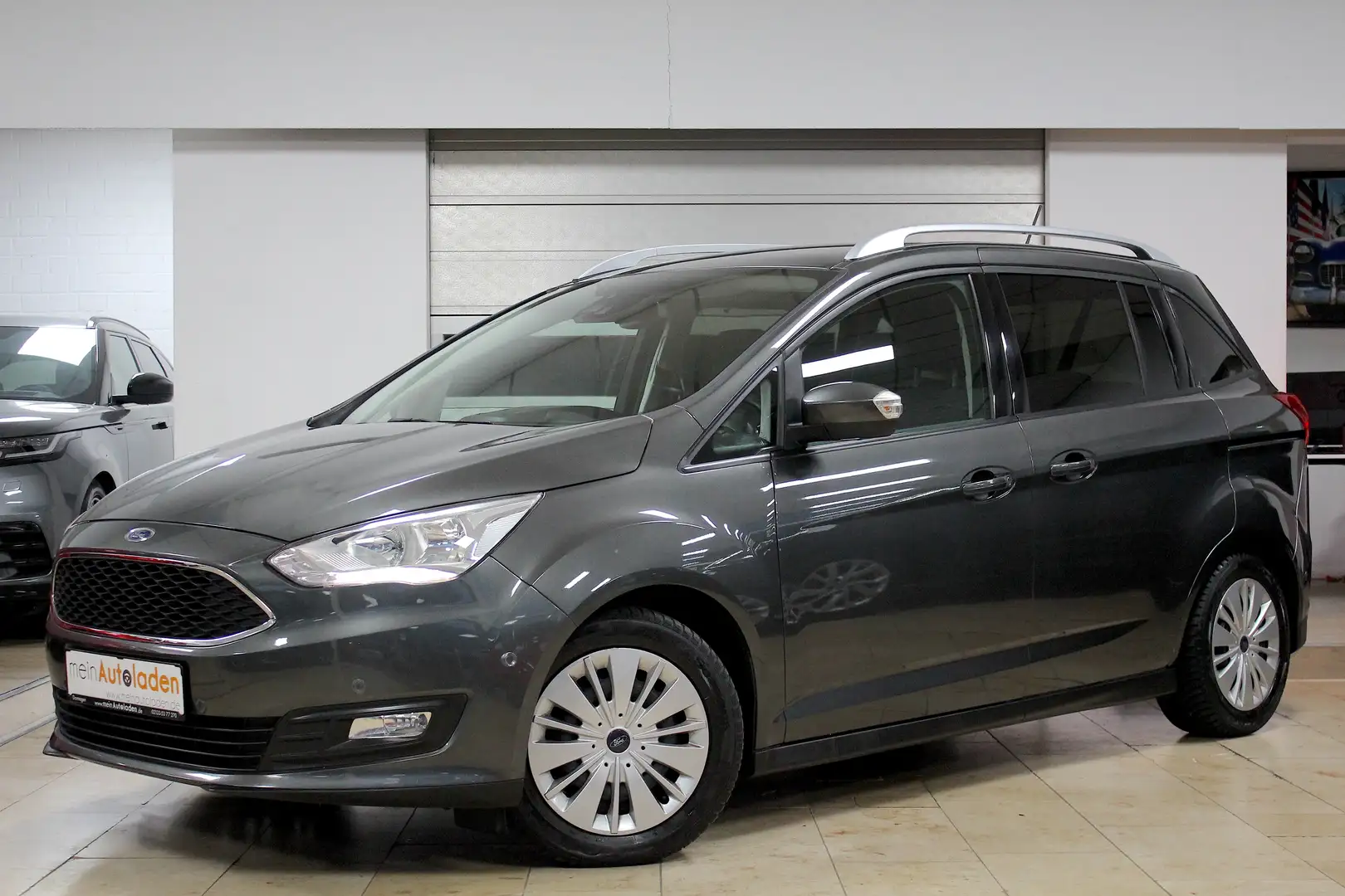 Ford Grand C-Max 1,0 EcoBoost *7-SITZER*NAVI*PARKASSIST*KAMERA*LED* Grijs - 1
