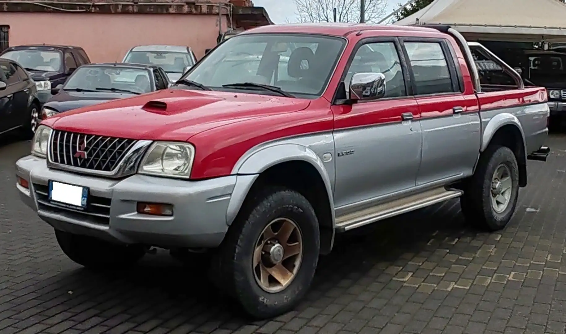 Mitsubishi L200 L200 d.cab 2.5 tdi GLS 4wd 115cv Grigio - 1