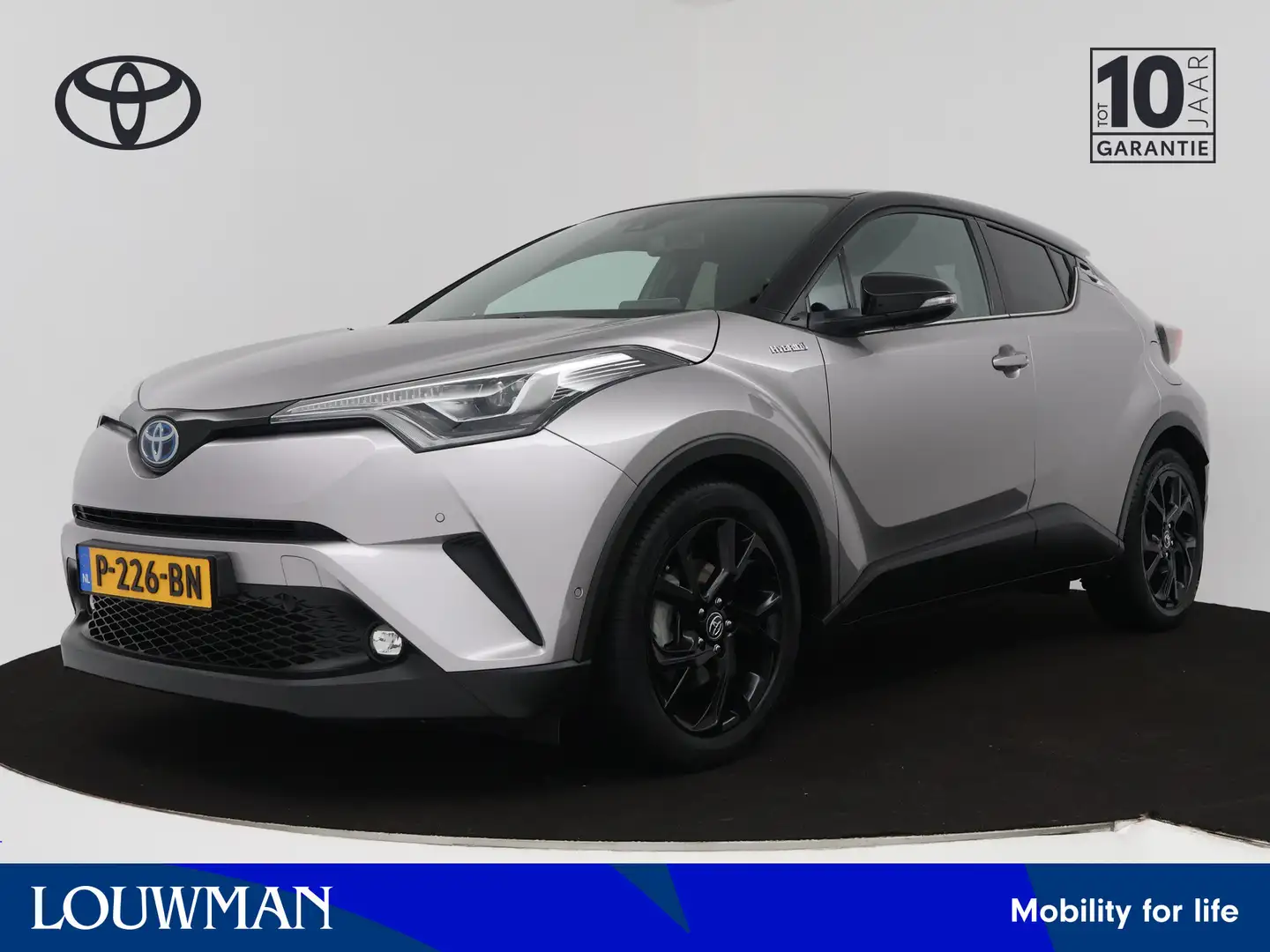 Toyota C-HR 1.8 Hybrid Style Bi-Tone | Navigatie | Camera | St Grijs - 1