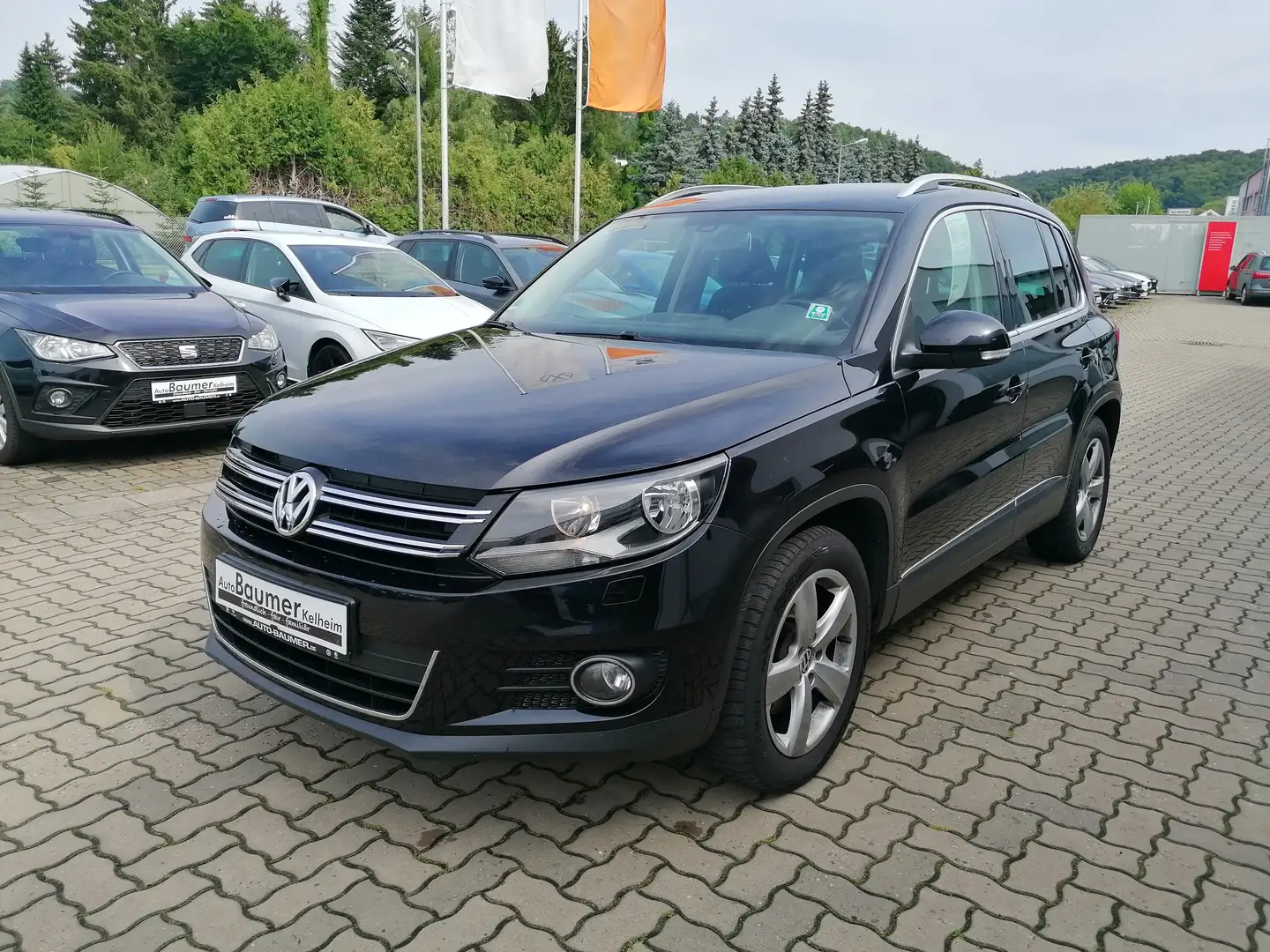 Volkswagen Tiguan 1.4 TSI Sport & Style AHK SHZ Navi TÜV 26 Černá - 1