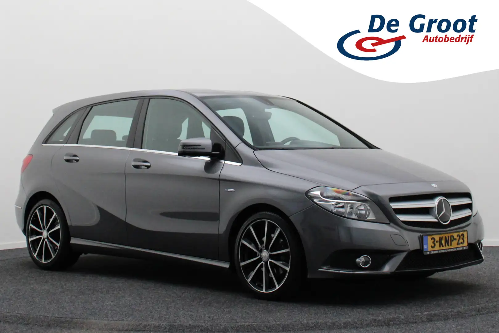 Mercedes-Benz B 180 Ambition Navigatie, Stoelverwarming, Airco, Blueto Gris - 1