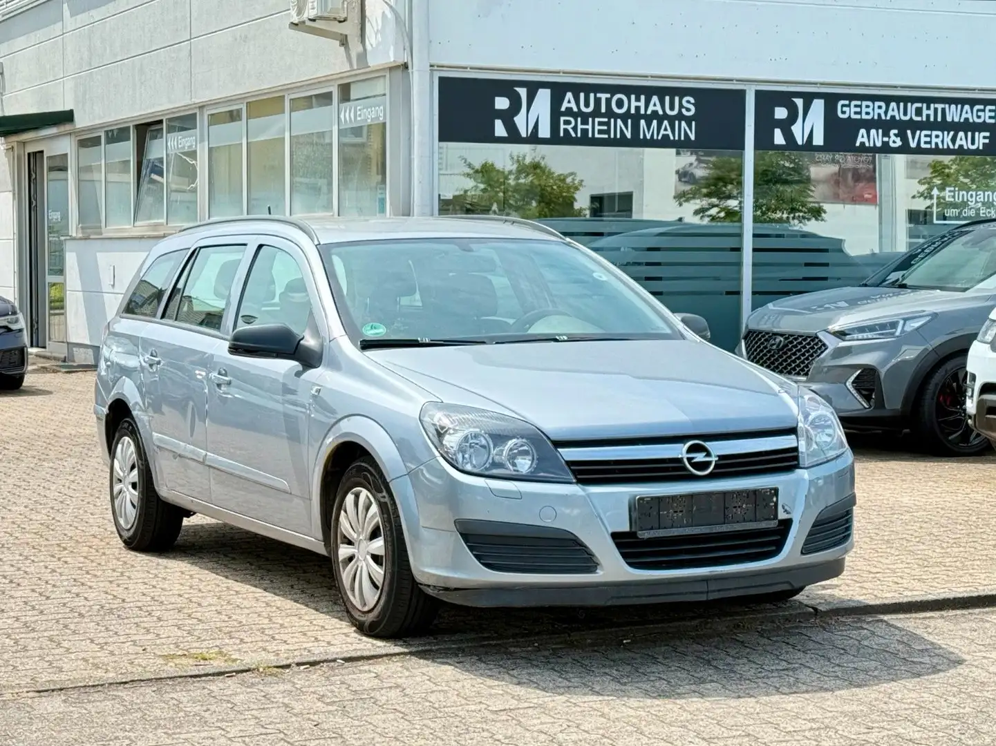 Opel Astra H 1.6 Caravan*Tüv03.2027*Ahk*Navi Silber - 1