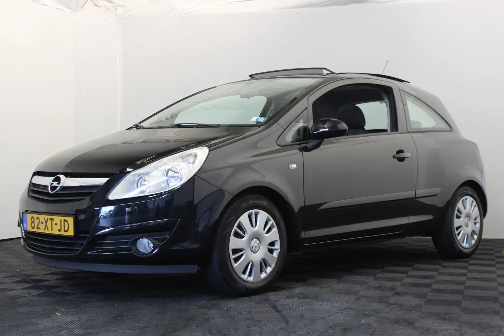 Opel Corsa 1.4-16V Enjoy |Pano| Zwart - 1