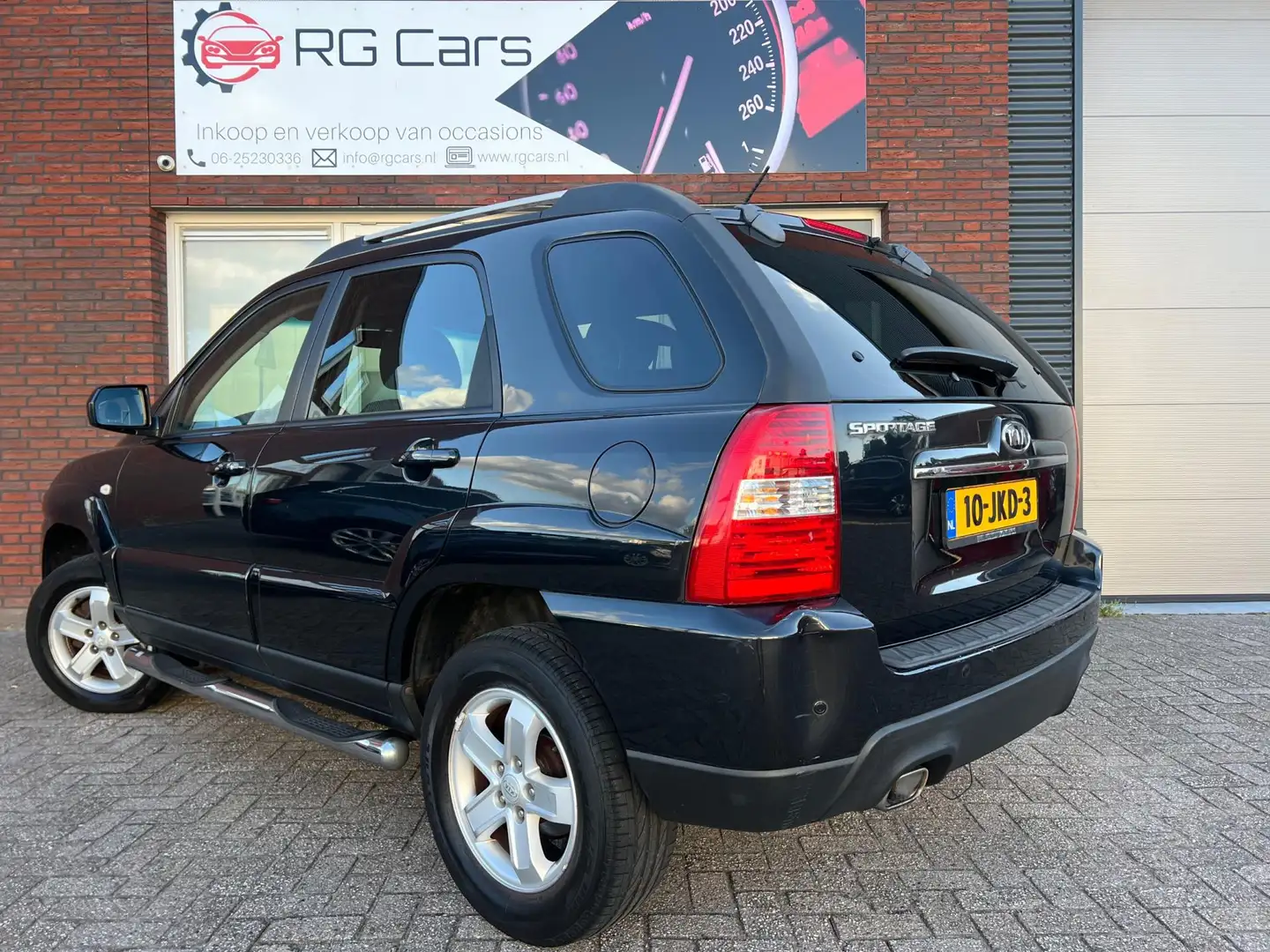 Kia Sportage 2.0 CVVT X-tra / PDC / Airco / Cruise / NAP / LM Negro - 2