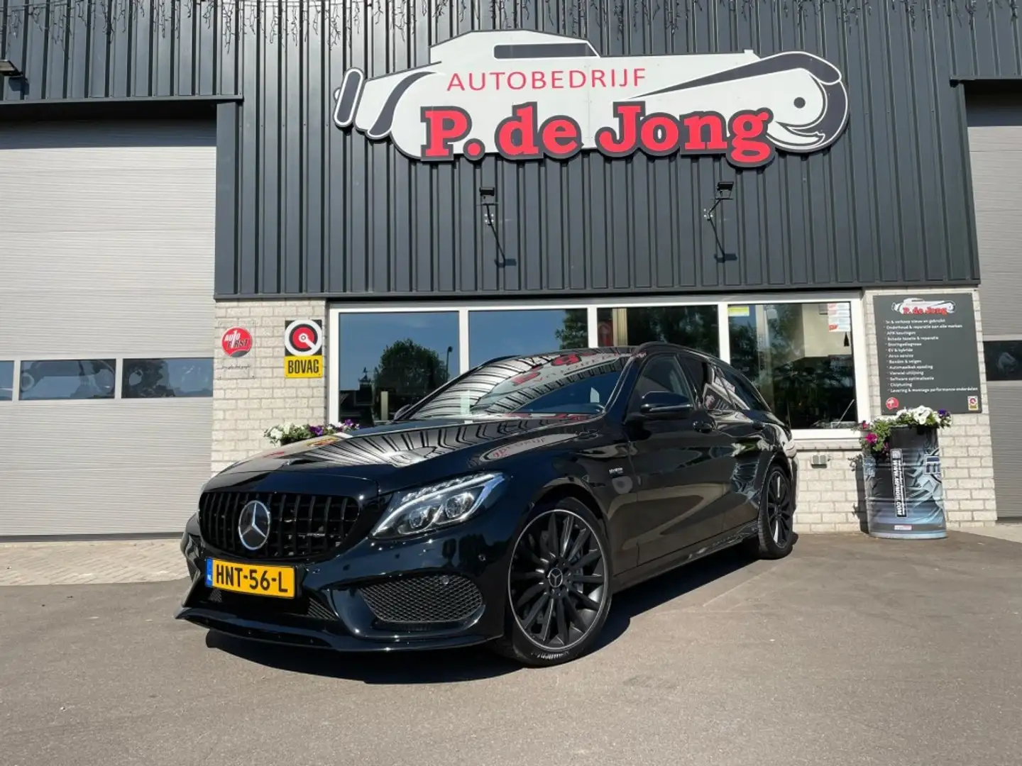 Mercedes-Benz C 43 AMG C43 AMG, 4MATIC, Burmester, LED, Carbon, DAB, Trek Zwart - 1