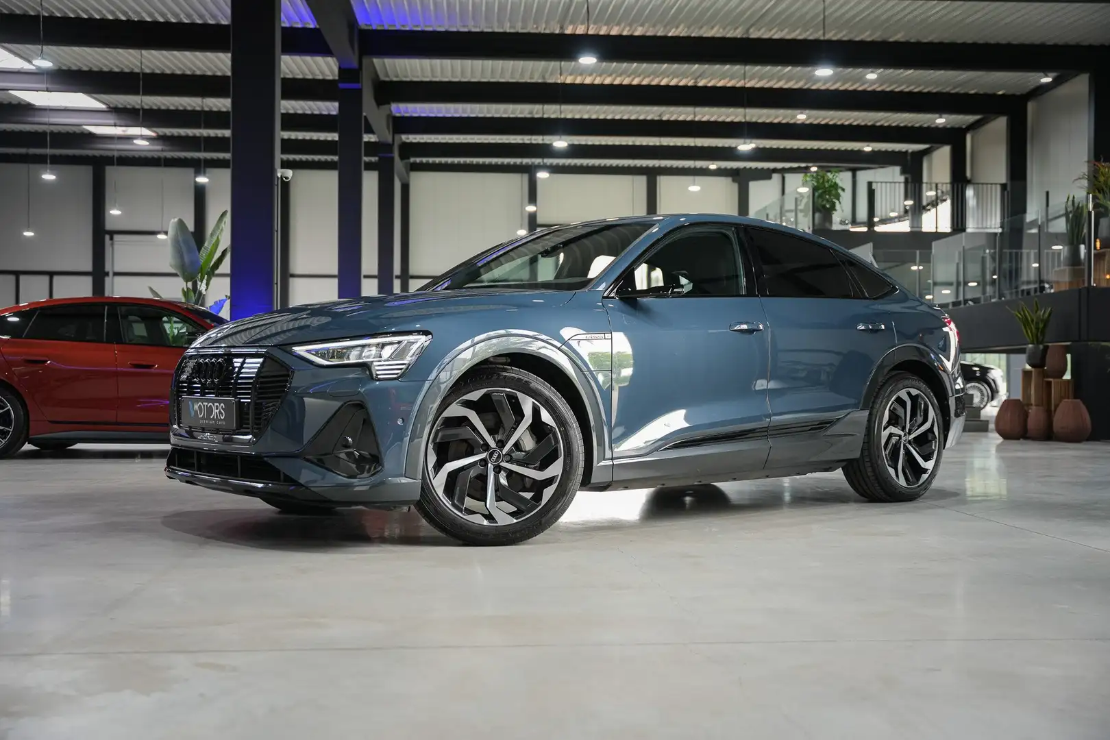Audi e-tron 95 kWh 55 Sportrback Quattro Blauw - 1
