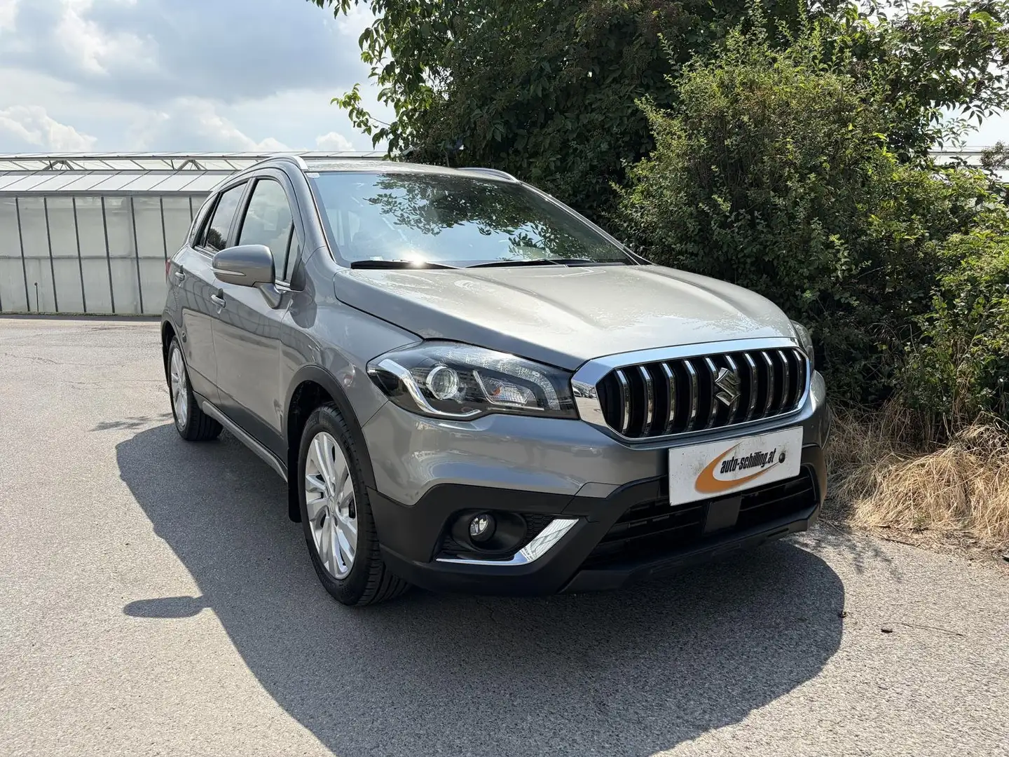 Suzuki SX4 S-Cross 1,4 Shine 4WD AllGrip Aut AHK Kamera Navi 1.Besitz Grau - 1