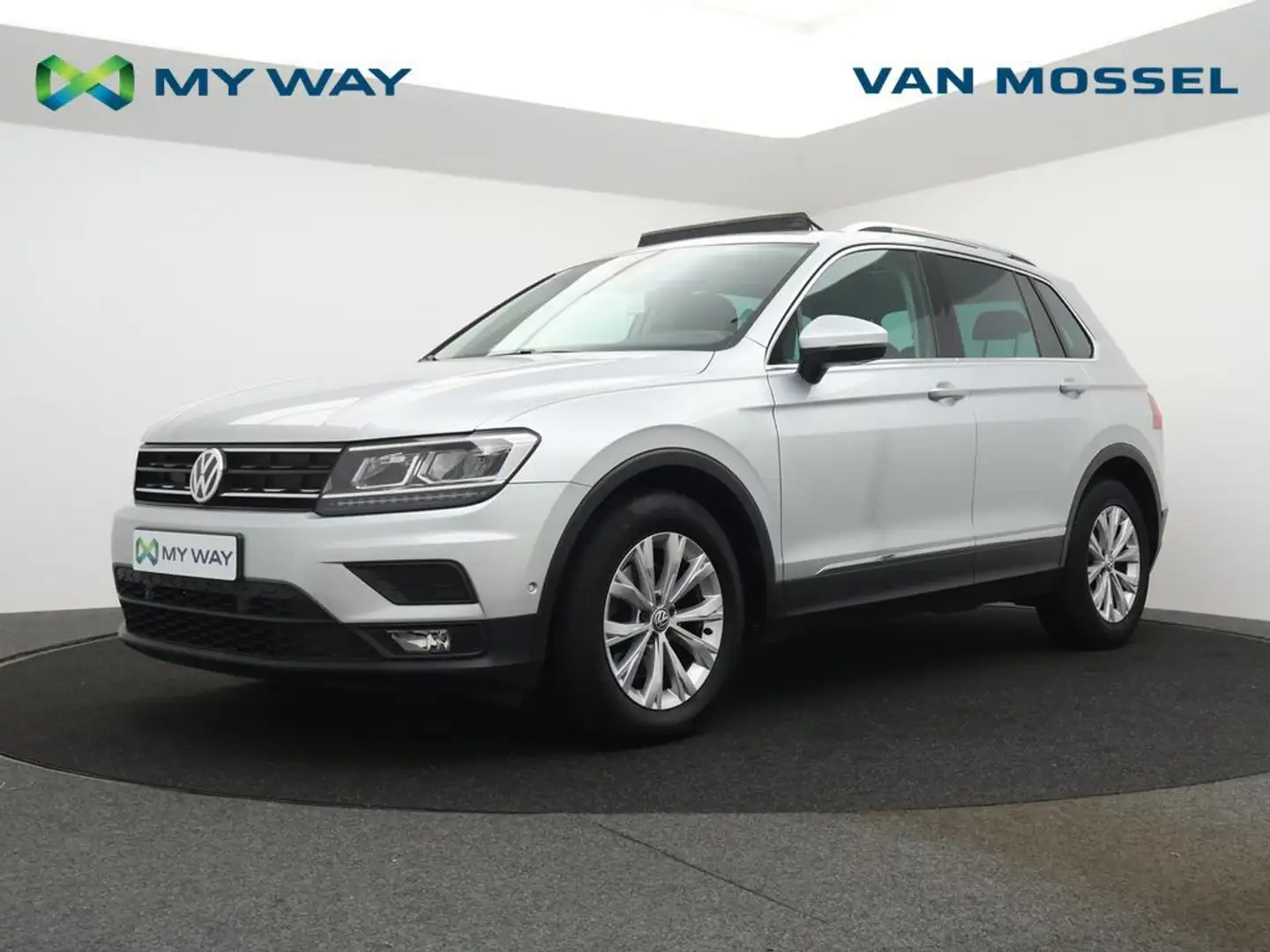 Volkswagen Tiguan 1.4TSI 125PK *PANO DAK*NAVI*BLTH*ZETELVERWARMING*... Zilver - 1