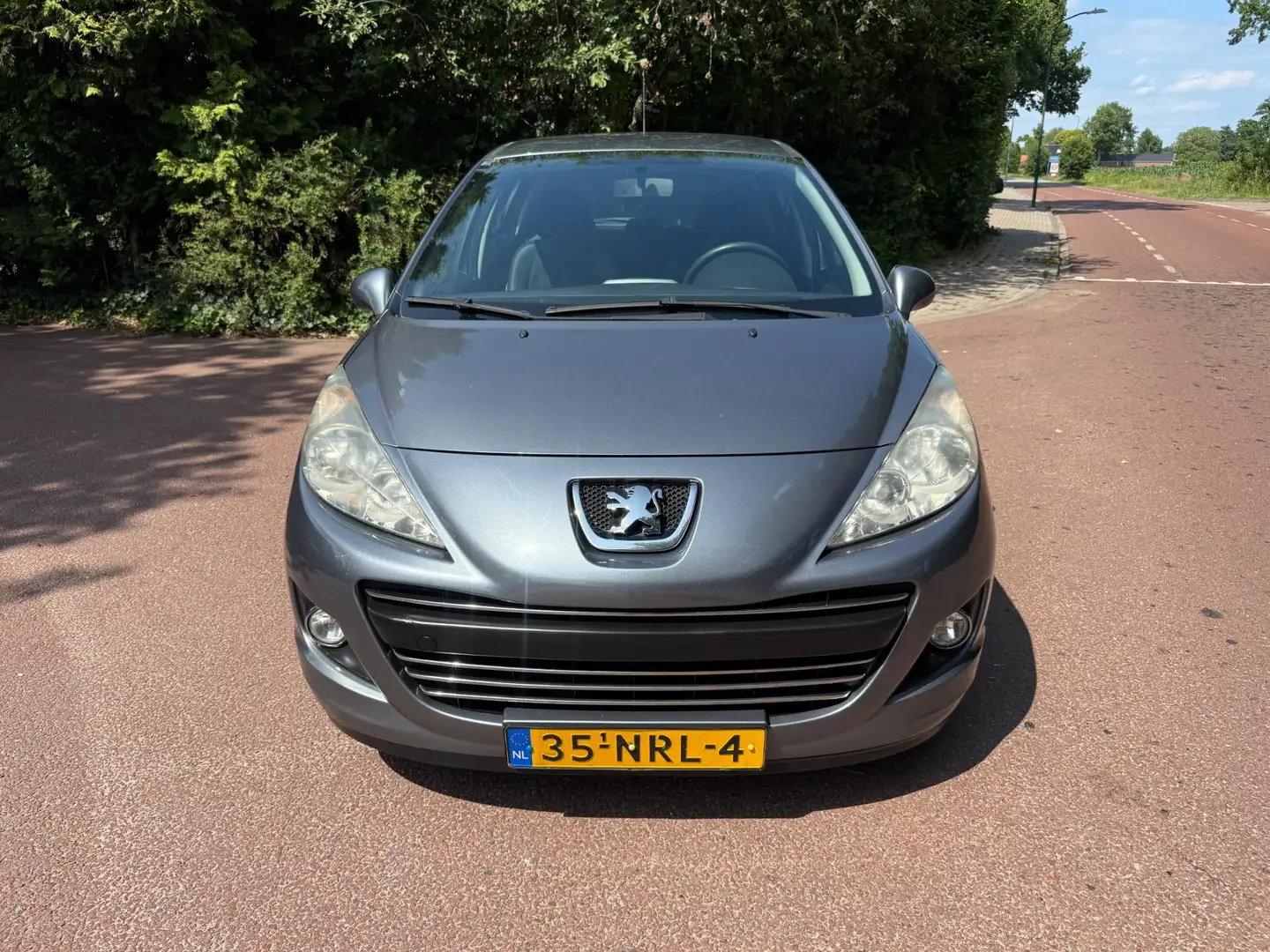 Peugeot 207 1.4 VTi Style / Airco / NAP / Apk / 5d / cruisecon Grijs - 2
