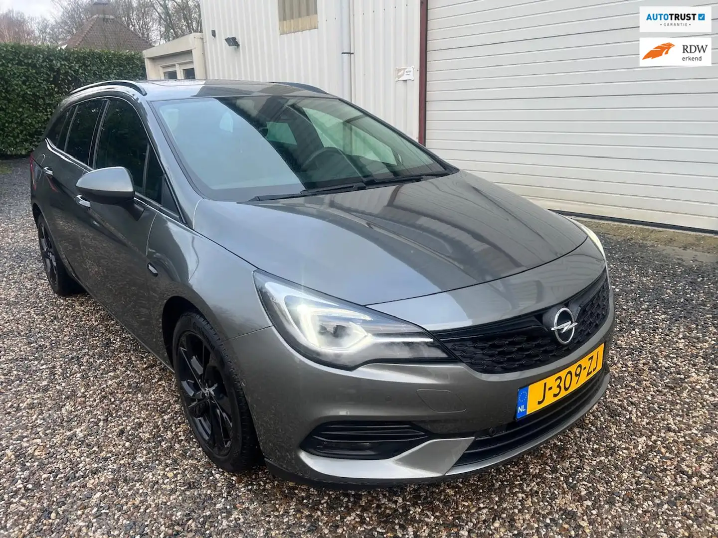 Opel Astra Sports Tourer 1.4 Ultimate AUT.DAKJE.NAVI.CAM.LEER Grau - 1