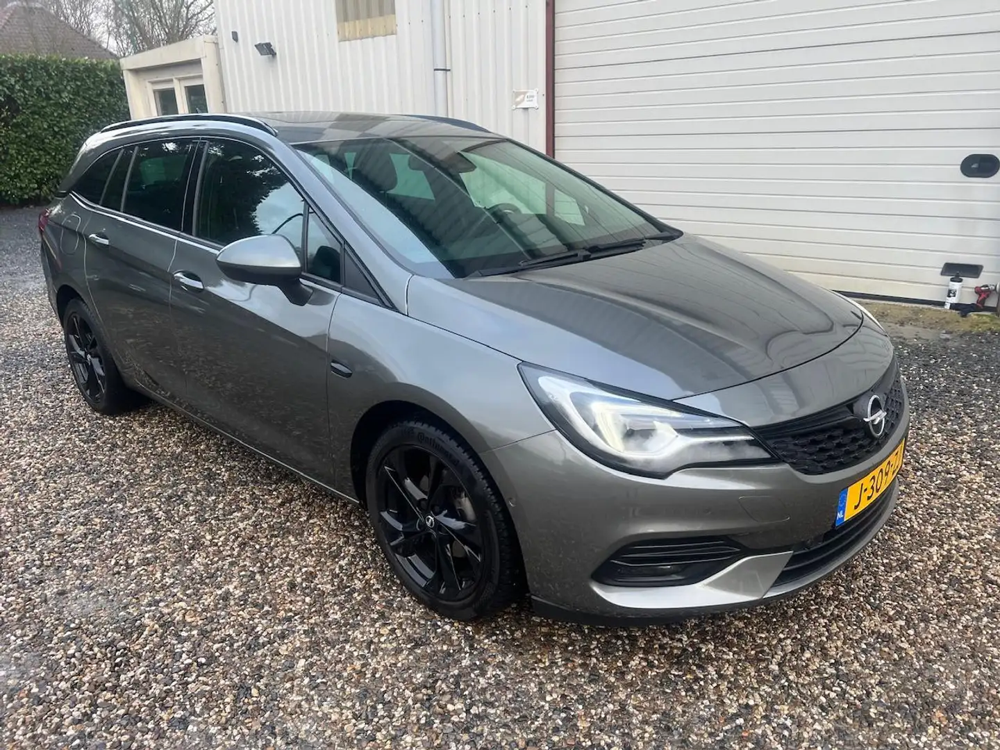 Opel Astra Sports Tourer 1.4 Ultimate AUT.DAKJE.NAVI.CAM.LEER Grau - 2