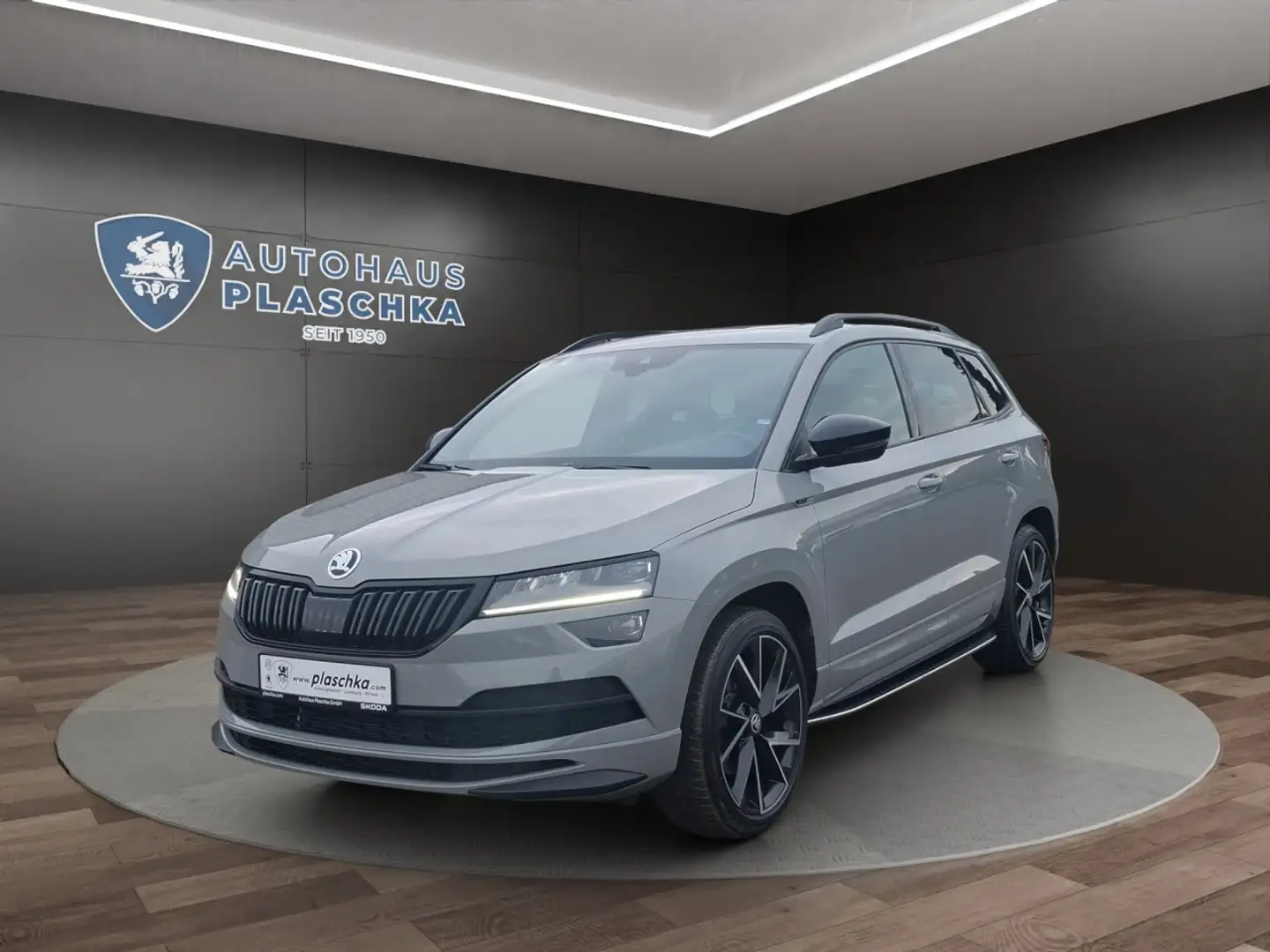 Skoda Karoq 2.0 TSI DSG Sportline 4x4 PANO+CANTON+KAM Klima Grau - 1