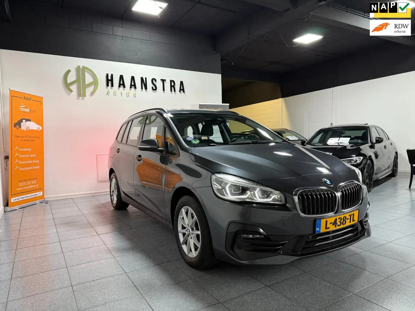 BMW 218 2-serie Gran Tourer 218i Business Edition Autom Na Grijs - 1