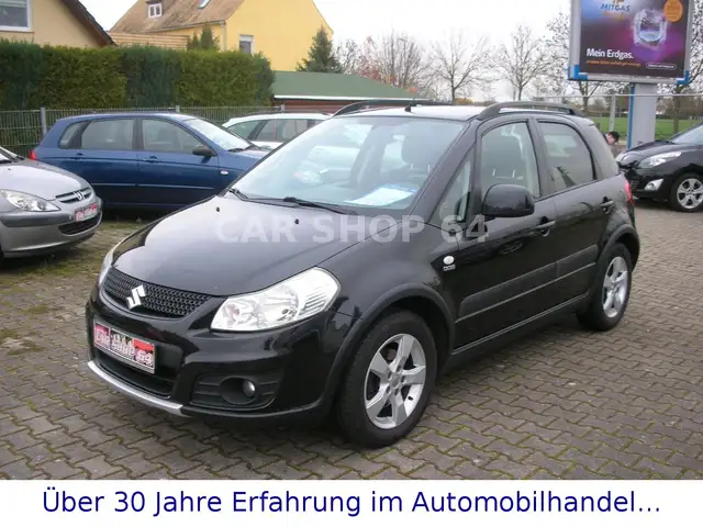 Suzuki SX4 Club   -1.HAND/SCHECKHEFT-