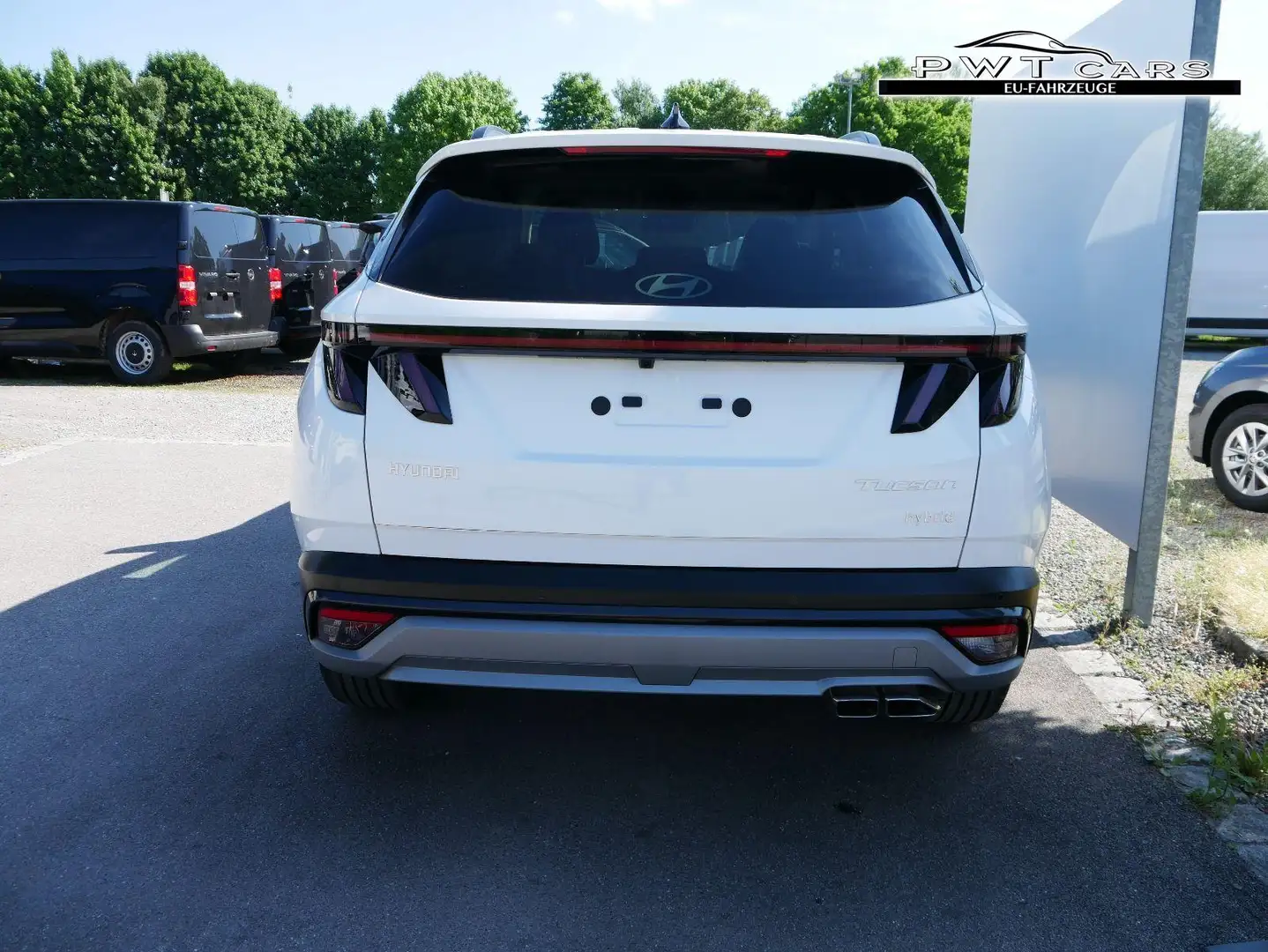 Hyundai TUCSON GO Plus 1.6 T-GDi HEV 4WD AT *PDC*RFK*NAVI*SHZ*... Weiß - 2