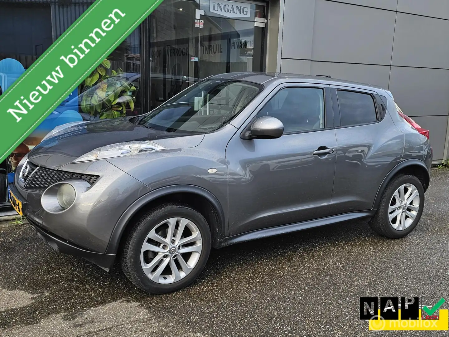 Nissan Juke 1.6 Acenta Leer/Navigatie/Camera/Trekhaak Gris - 1