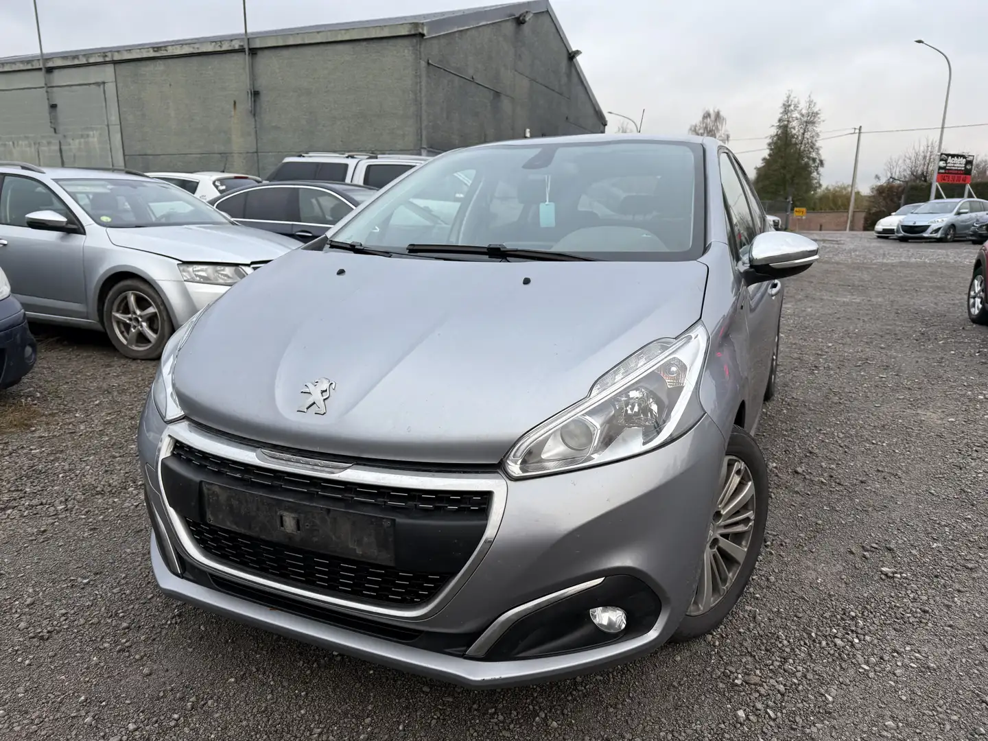 Peugeot 208 208 1.2i PureTech signature  S Grijs - 1