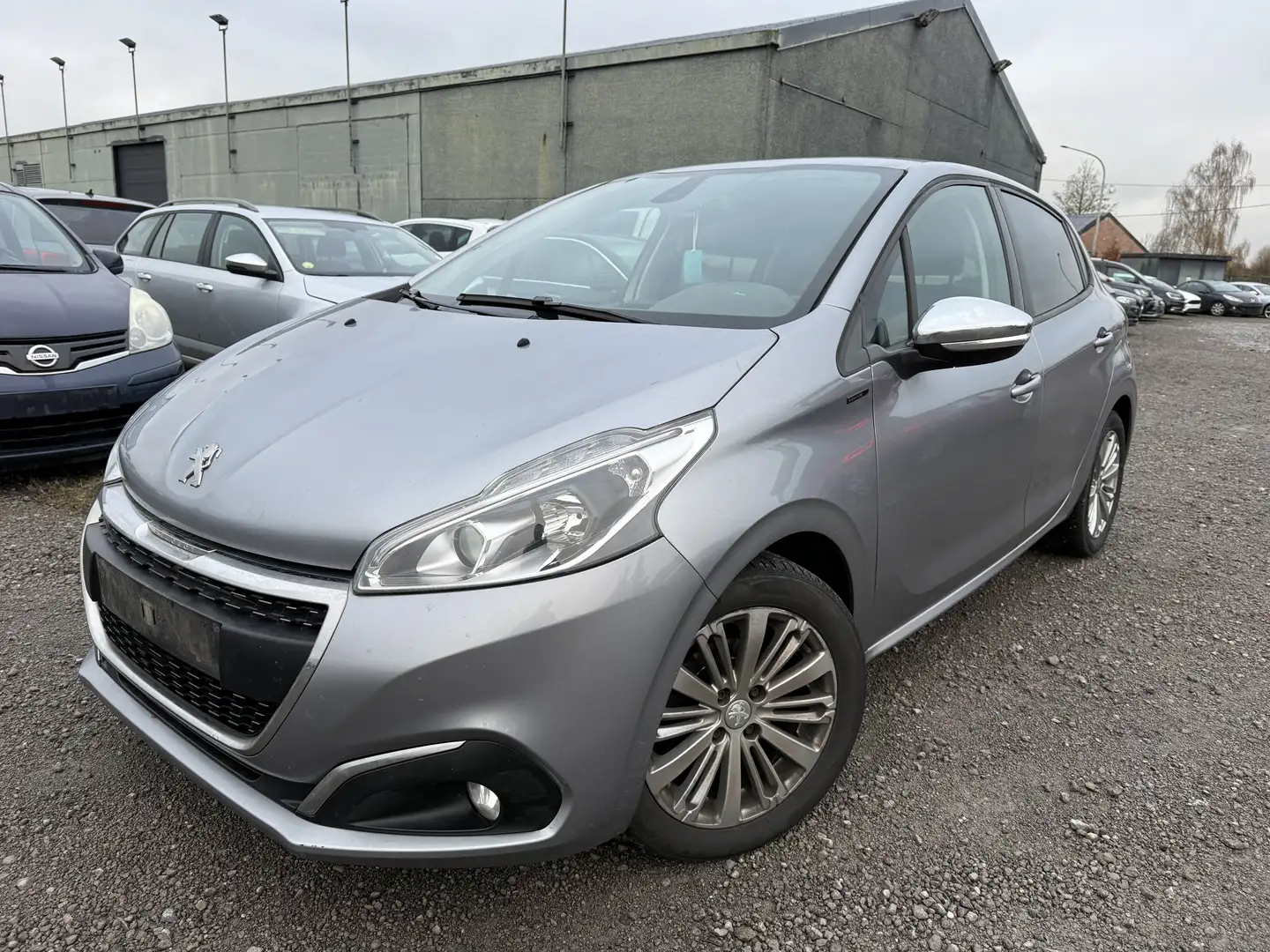 Peugeot 208 208 1.2i PureTech signature  S Grijs - 2