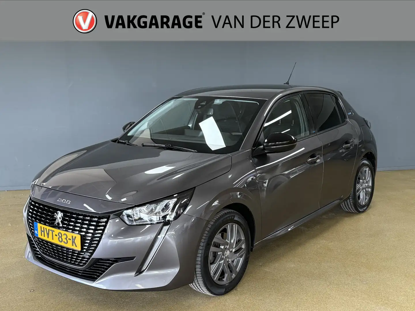 Peugeot 208 1.2 PureTech Allure | Navi | Carplay Grijs - 1