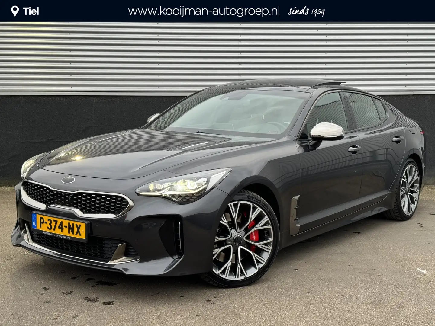 Kia Stinger 3.3 V6 T-GDI AWD GT 370 PK, Schuif/kanteldak, Lede Grijs - 1