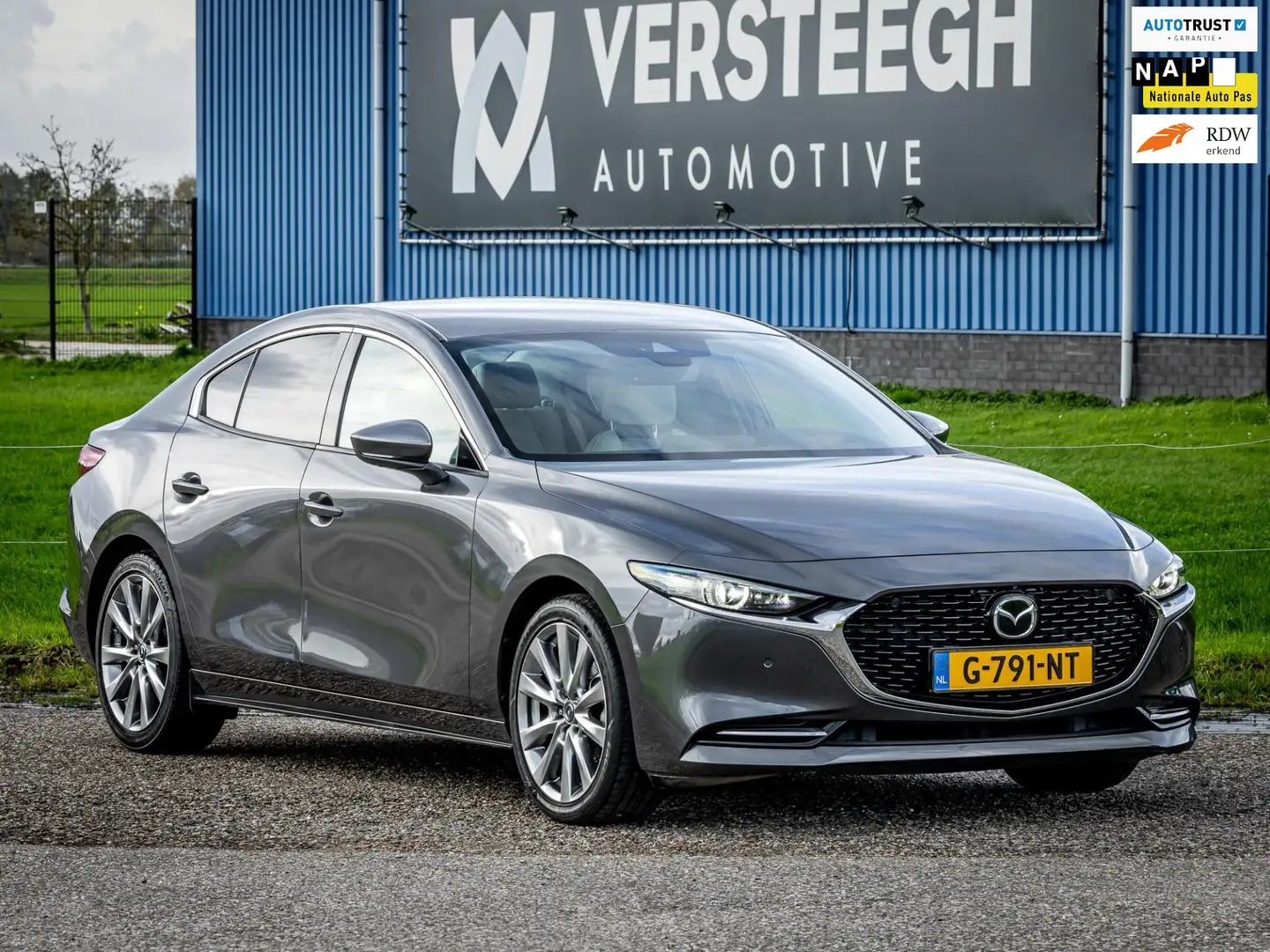 Mazda 3 2.0 e-SkyActiv-X M Hybrid 180 Luxury Leder|HeadUp Grijs - 1