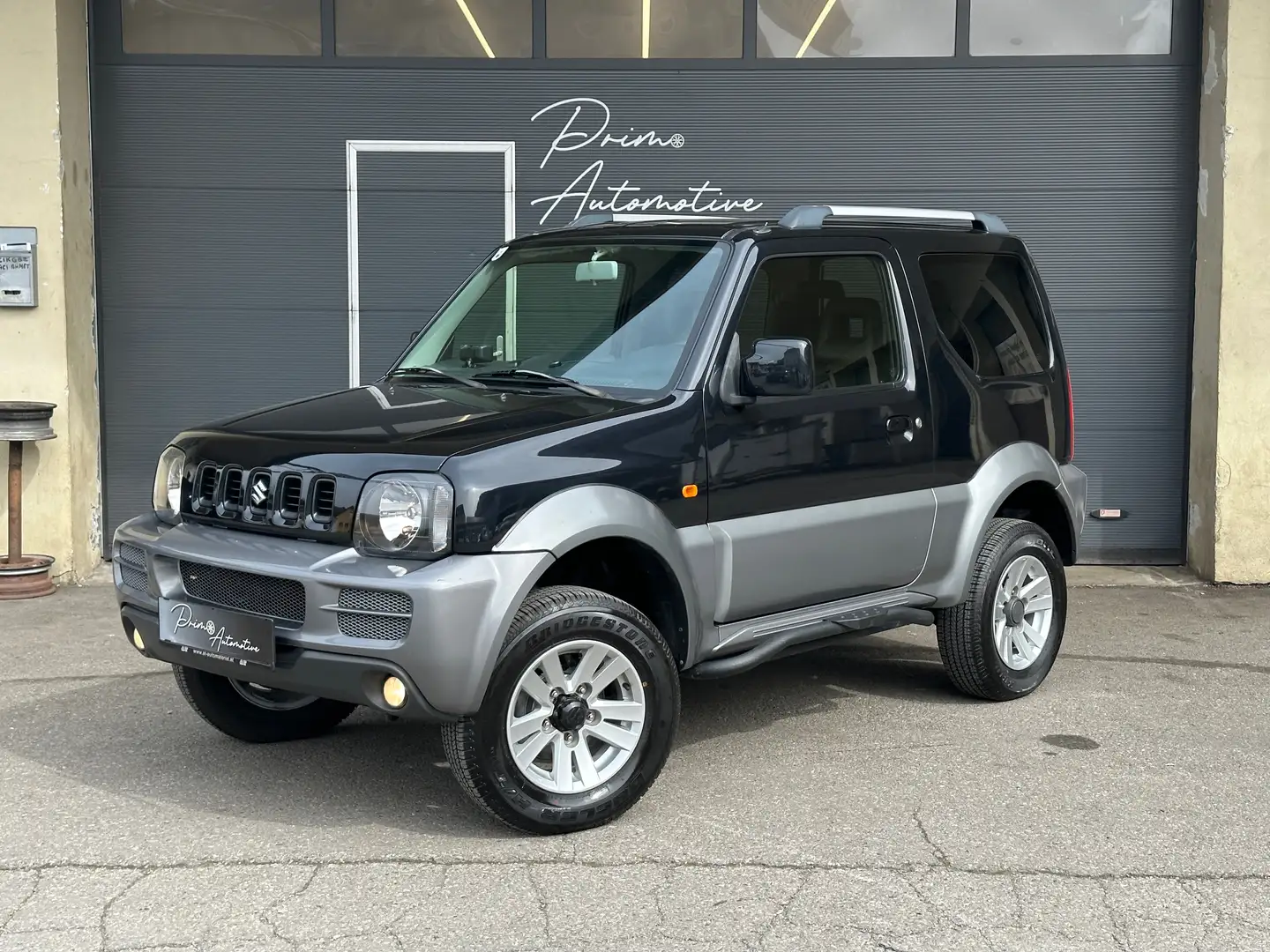 Suzuki Jimny 1,3 VX 4WD Deluxe Allrad* NAVI* Leder* AHK* Schwarz - 2