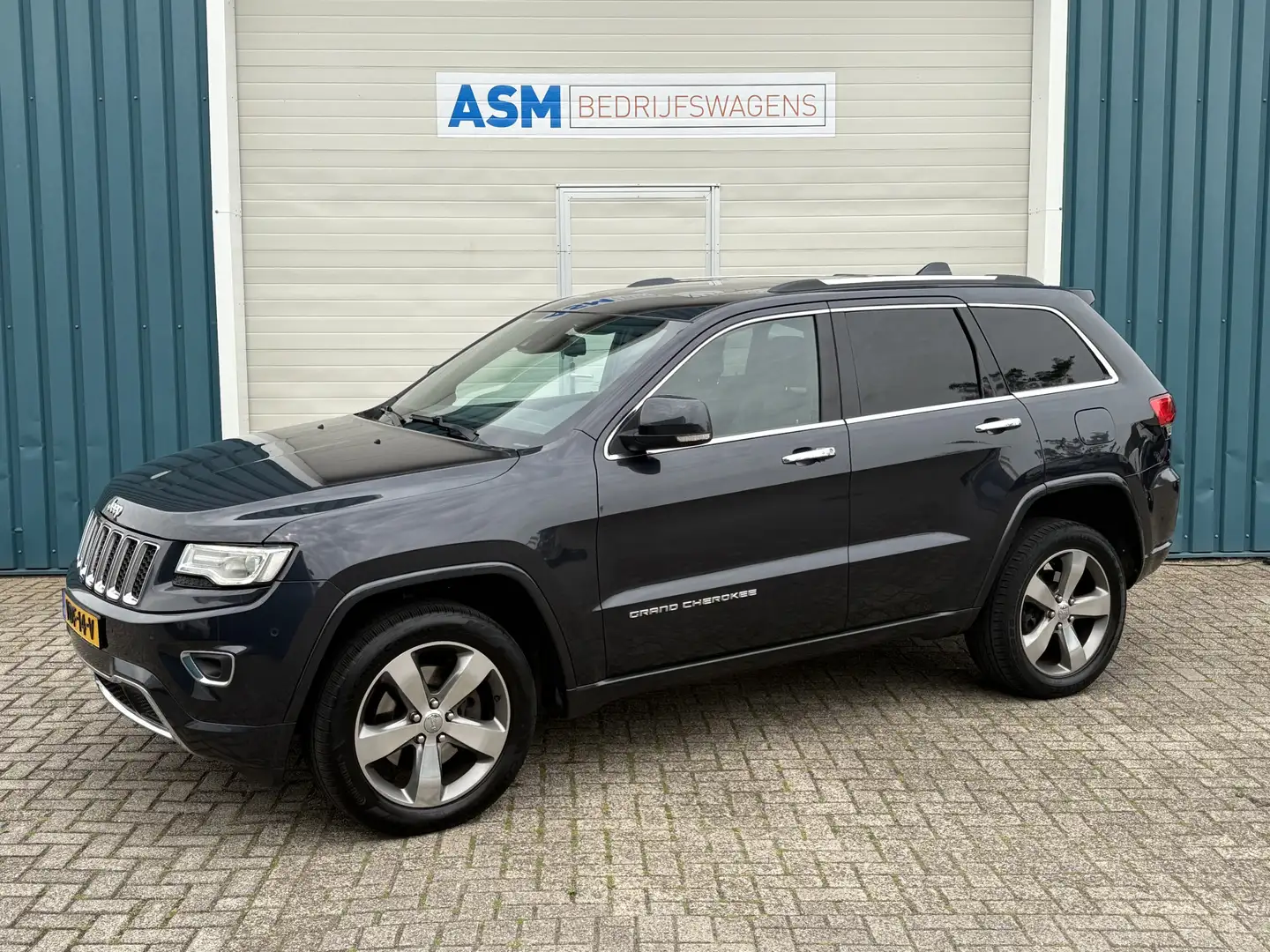 Jeep Grand Cherokee 3.0 251Pk CRD Overland / Cruise / Airco / Navi / T Modrá - 1