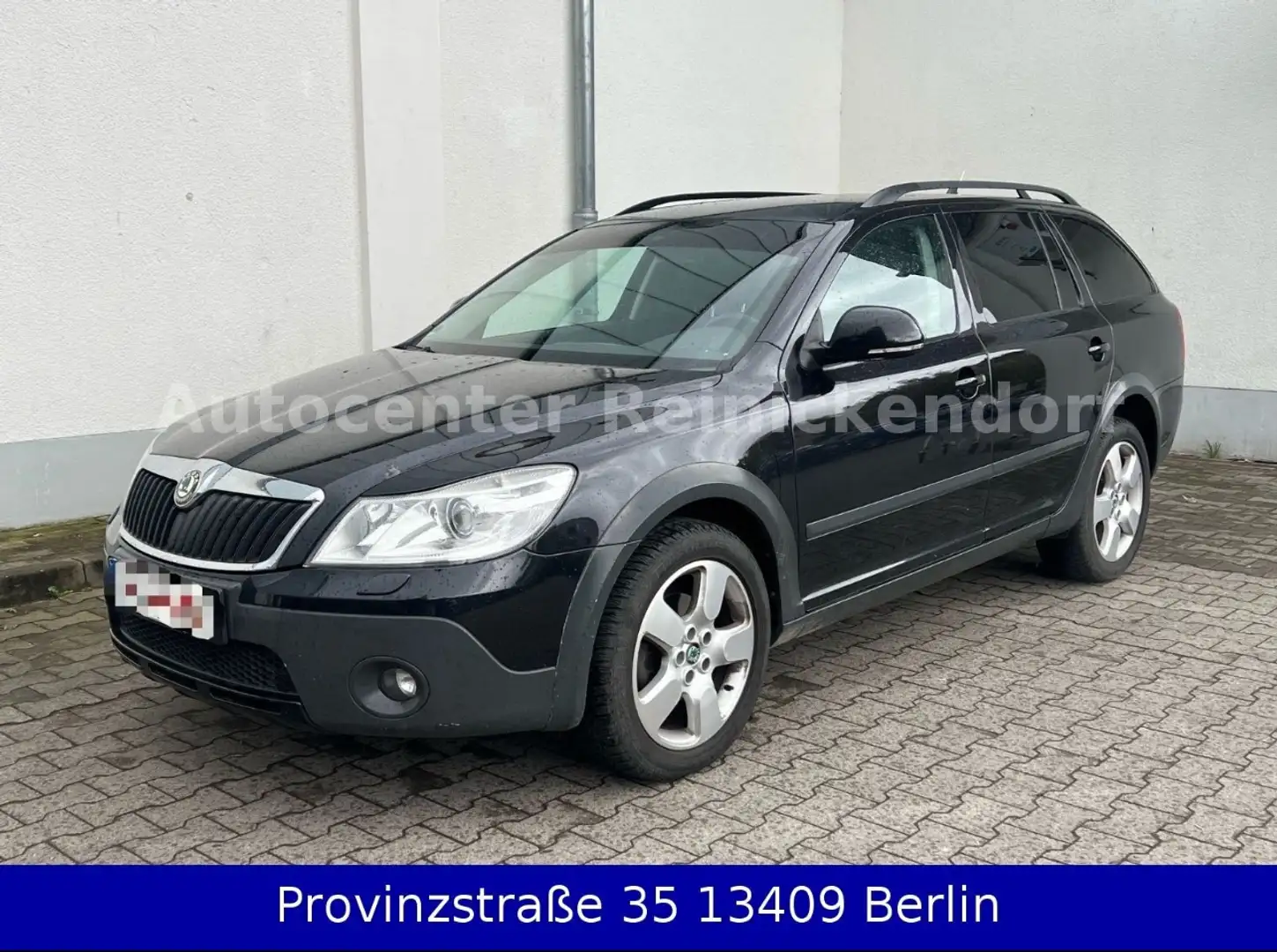 Skoda Octavia 1.8 TSI Scout 4X4 Kombi *Xenon+AHK+PDC* Schwarz - 1