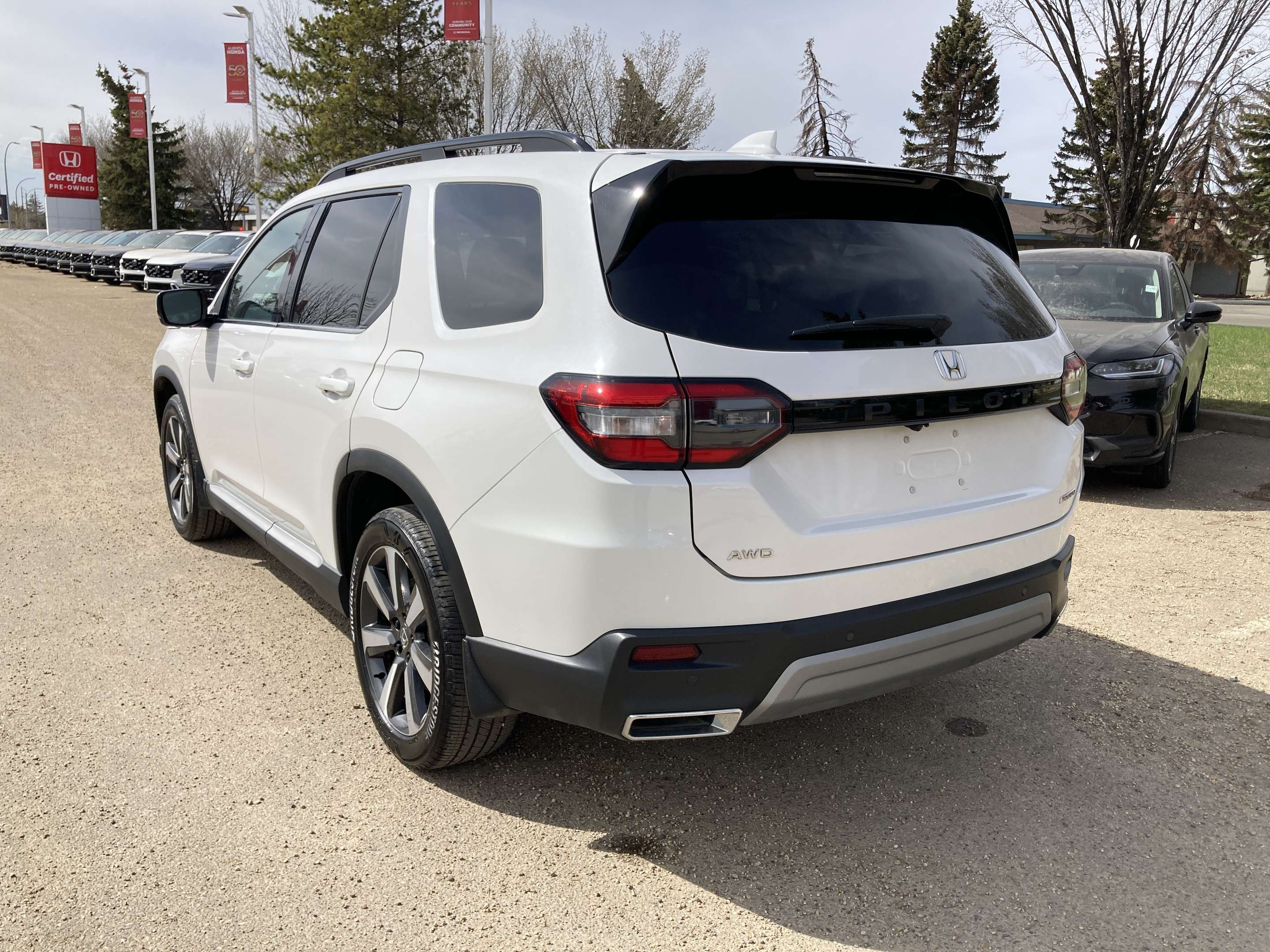 used 2025 Honda Pilot car, priced at $59,900