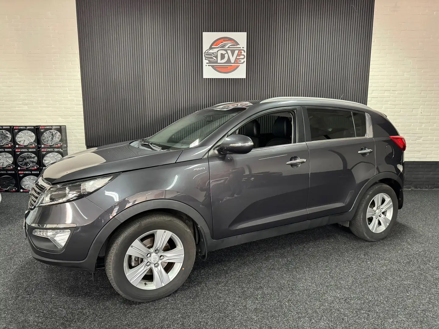 Kia Sportage 2.0 X-ecutive 4wd Plus Pack, AUTOMAAT, CLIMAT, HAL Grijs - 1