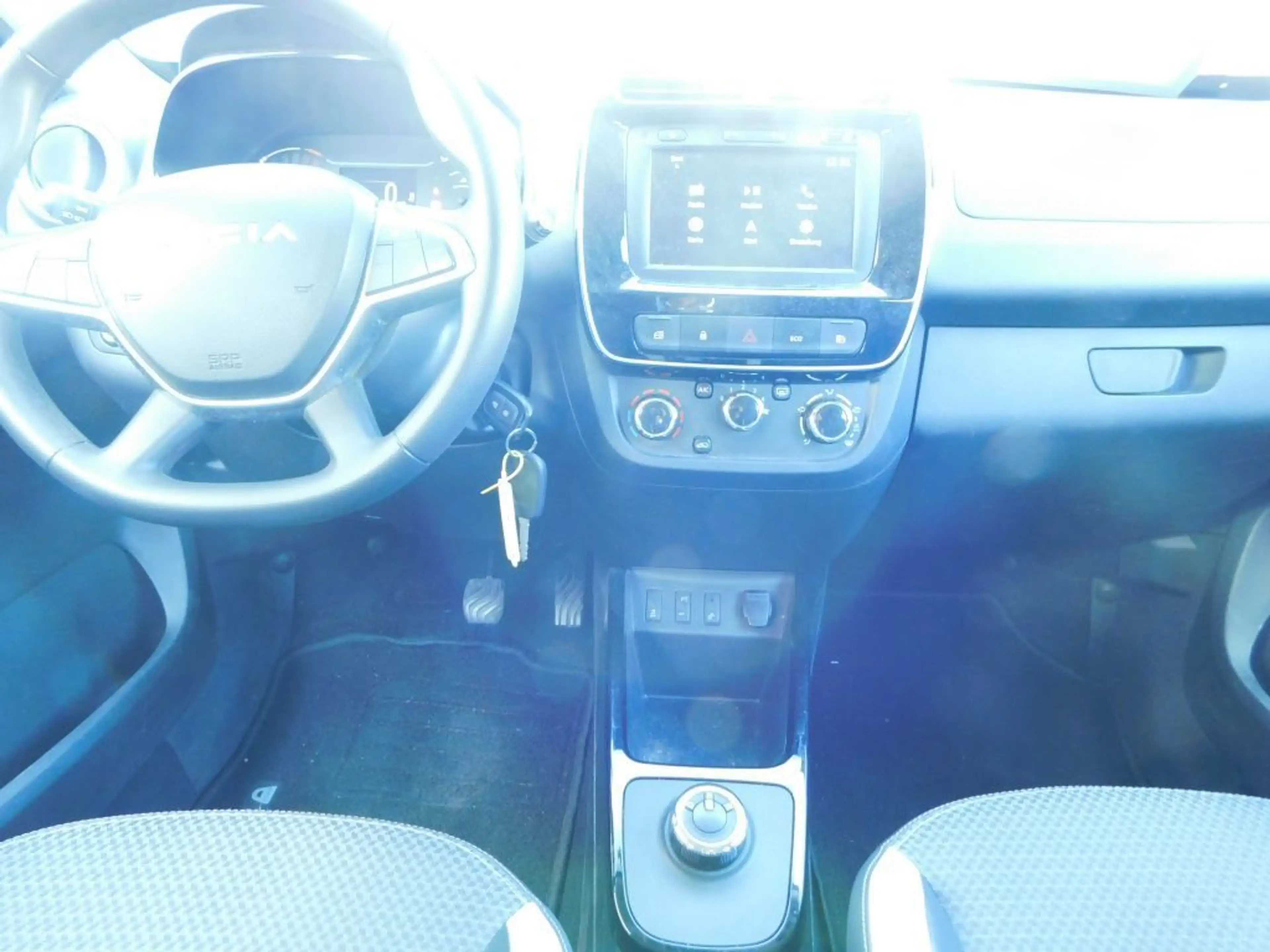 Dacia Spring Essential — photo 8