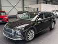 Skoda Octavia Combi 2.0 TDI DSG 4x4 Scout 8-fach PDC Zwart - thumbnail 1