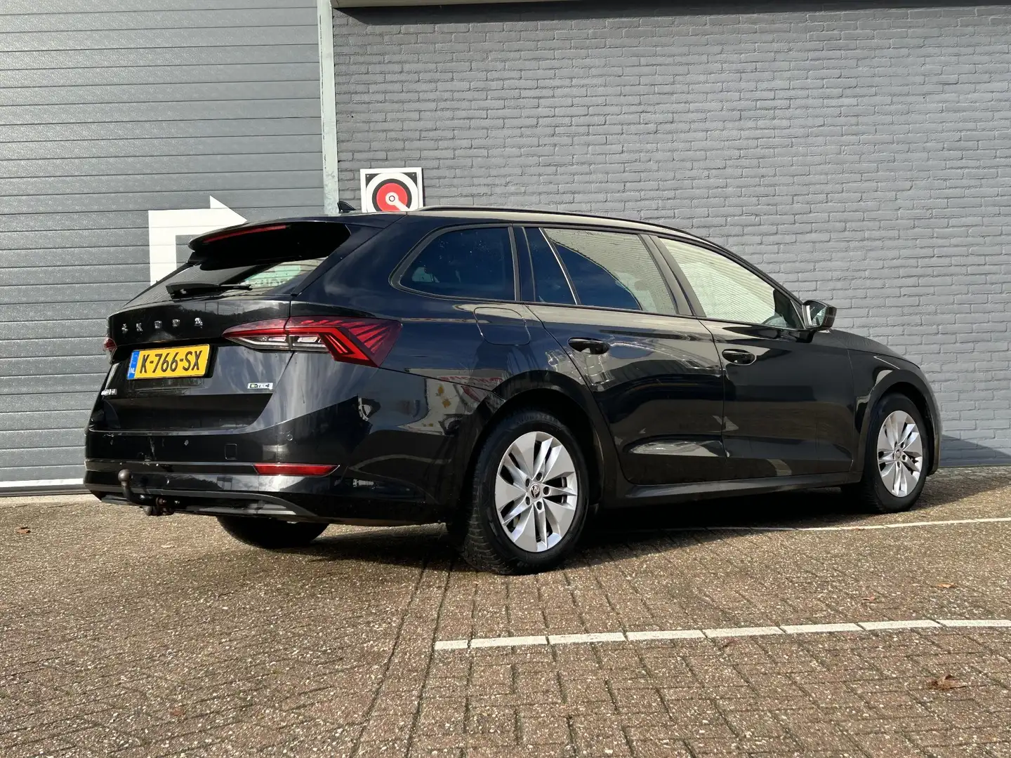 Skoda Octavia Combi 1.0 e-TSI Sport Business | € 9.500,- NETTO! Zwart - 2