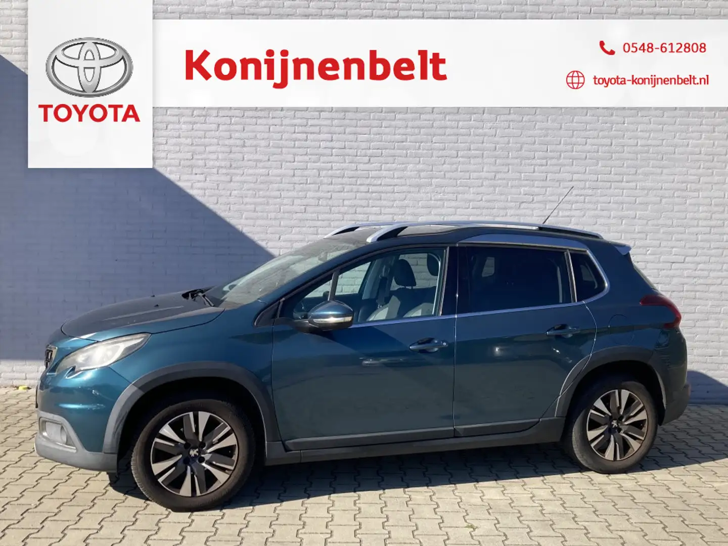 Peugeot 2008 1.2 PureTech Allure Automaat | Trekhaak | Navi | P Groen - 1