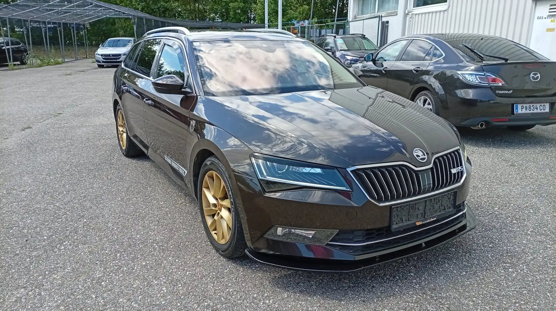 Skoda Superb 1.6 TDI Style Green tec Braun - 2