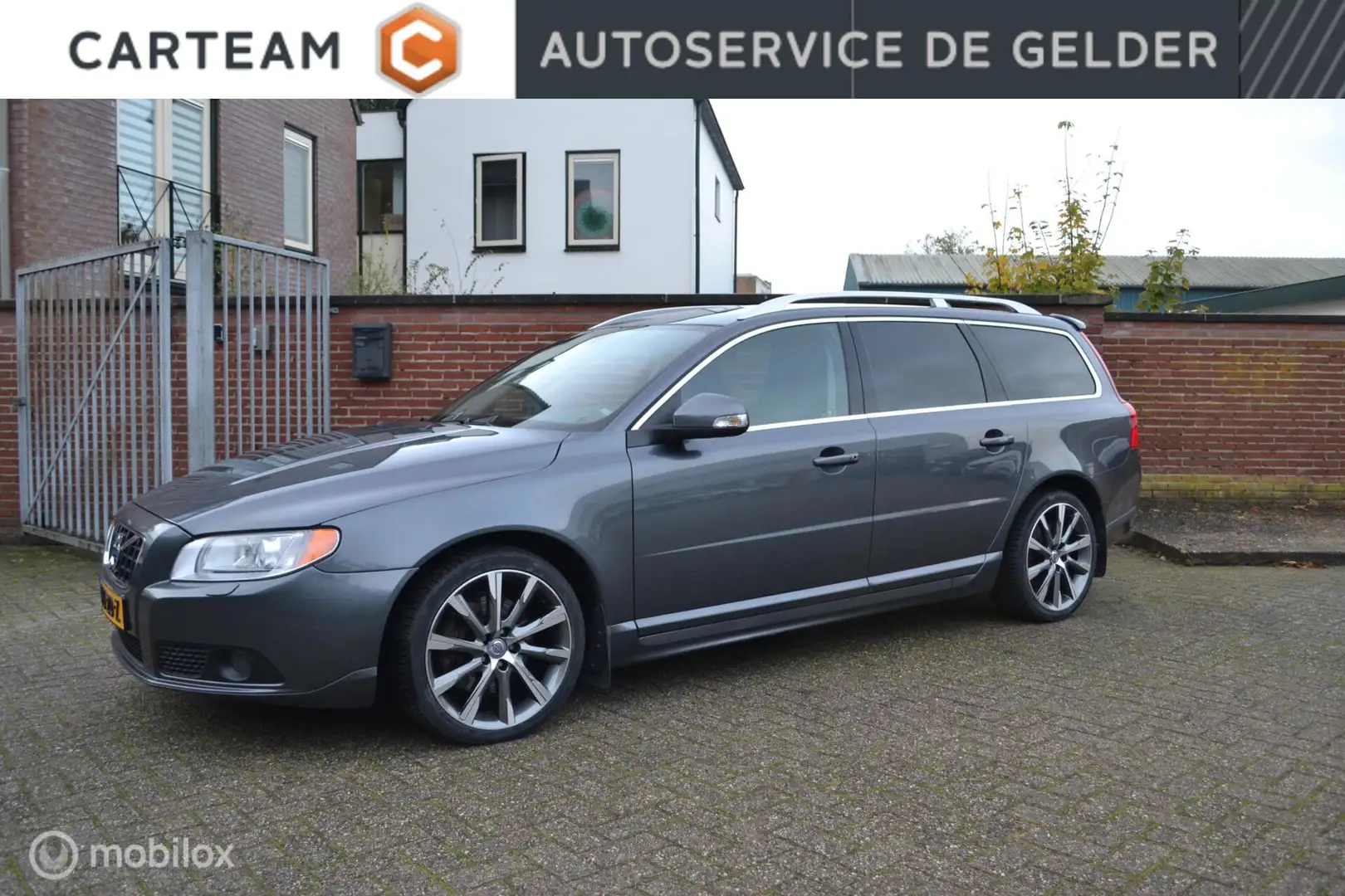 Volvo V70 3.0 T6 AWD Summum |Navi | Xenon | Leer | PDC | 18” Gris - 1