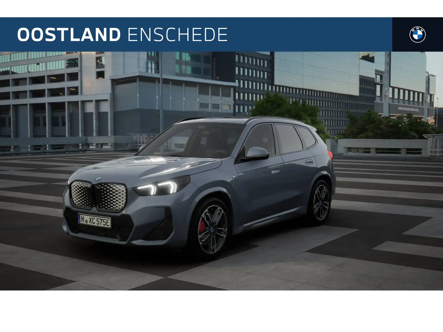BMW iX1 eDrive20 M Sport / Panoramadak / Trekhaak / Sports Grijs - 1