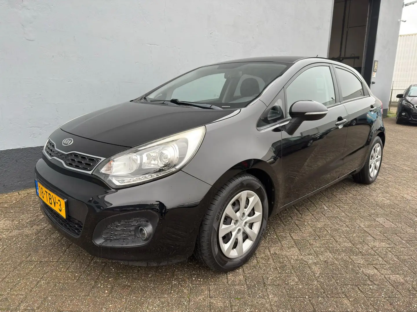 Kia Rio 1.2 CVVT Plus Pack 5-Deurs - Airco Schwarz - 1