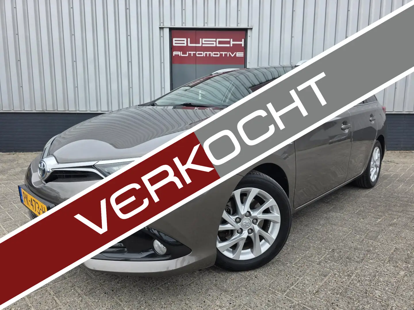 Toyota Auris Touring Sports 1.8 Hybrid Dynamic Go | 1e EIG | Grijs - 1