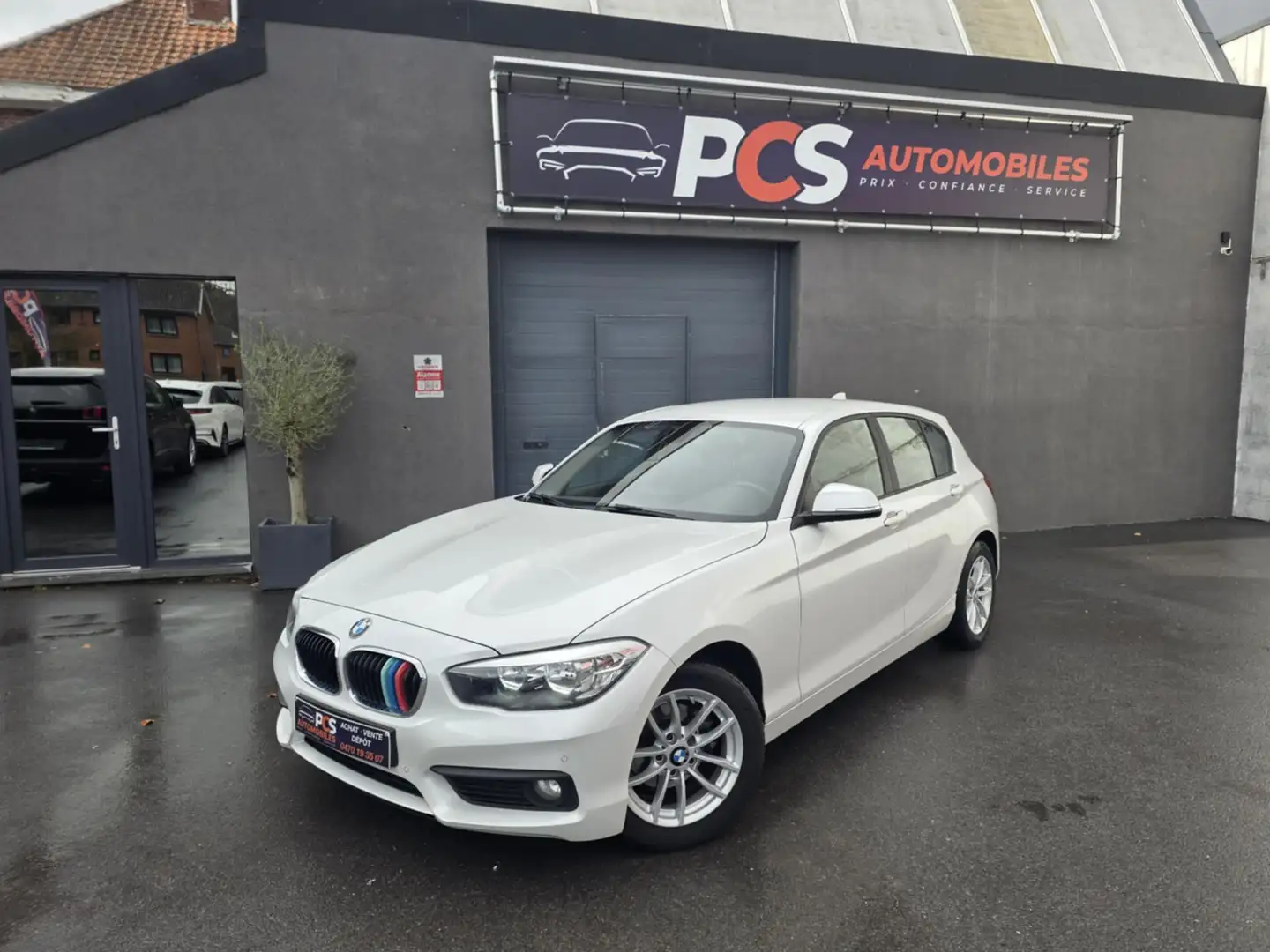 BMW 116 i JOY Edition*GPS*CLIM*PDC AVT-ARR*CARNET*GARANTIE Blanc - 1