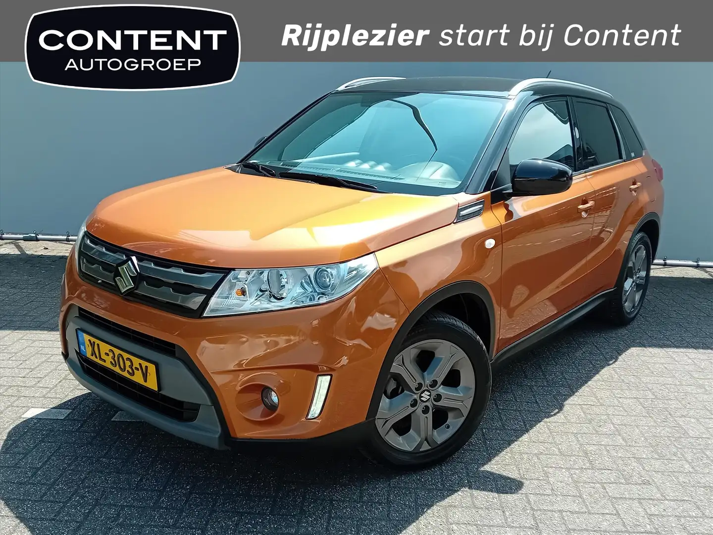 Suzuki Vitara 1.6 VVT 120pk 2WD Aut Exclusive l Trekhaak l Orange - 1