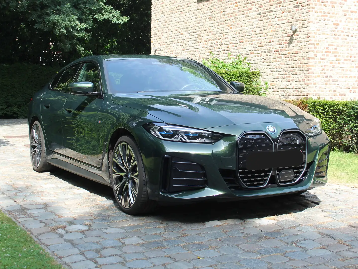 BMW i4 i4 eDrive35 Gran Coupe M Sport (BTW aftrekbaar) Groen - 1