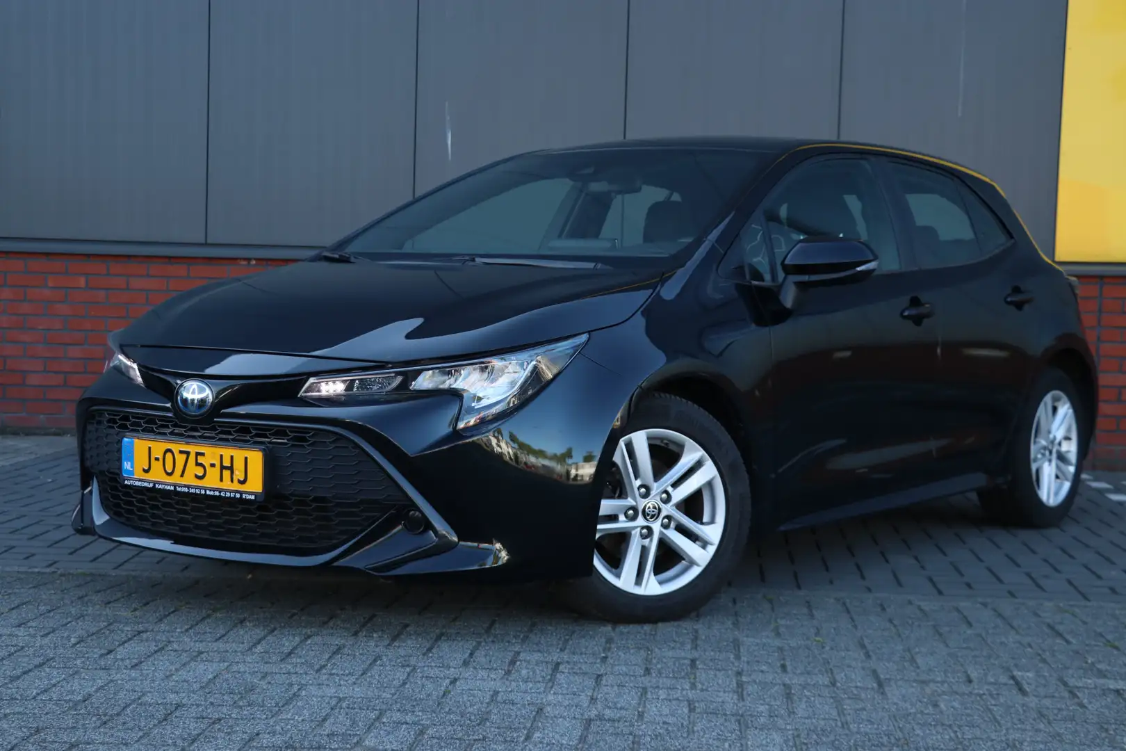 Toyota Corolla 1.8 Hybrid Business Automaat | Noir - 1