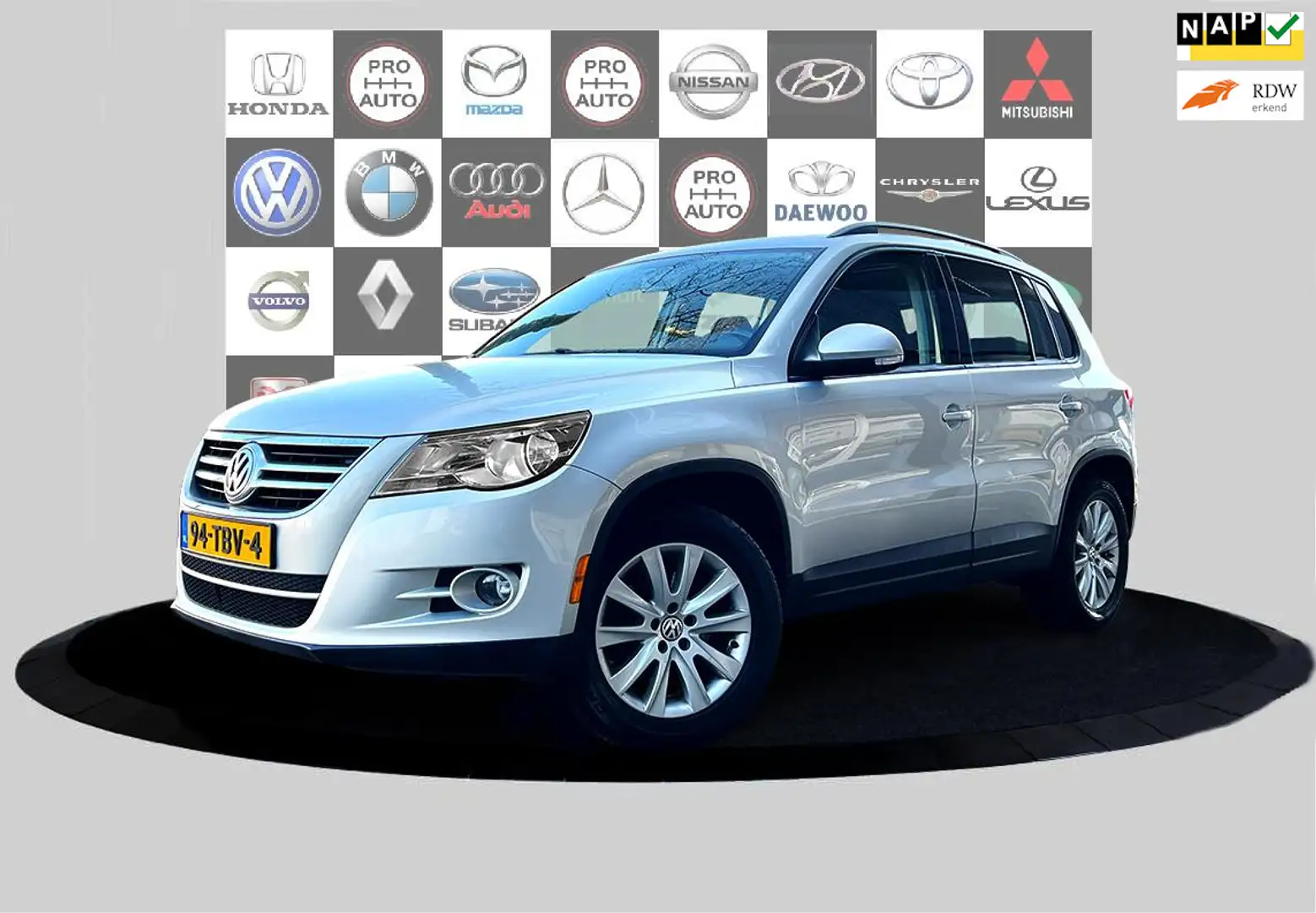 Volkswagen Tiguan 2.0 TSI Track&Field 4Motion Panorama_Trekh_Navi_de Beige - 1