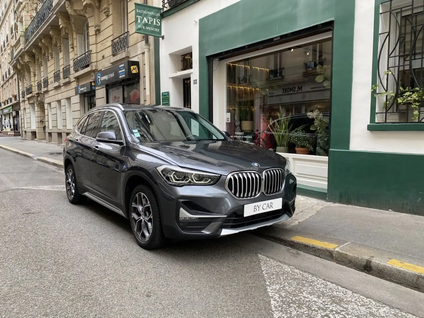 BMW X1 (F48) 2 SDRIVE18I 136 XLINE DKG7 Grijs - 1